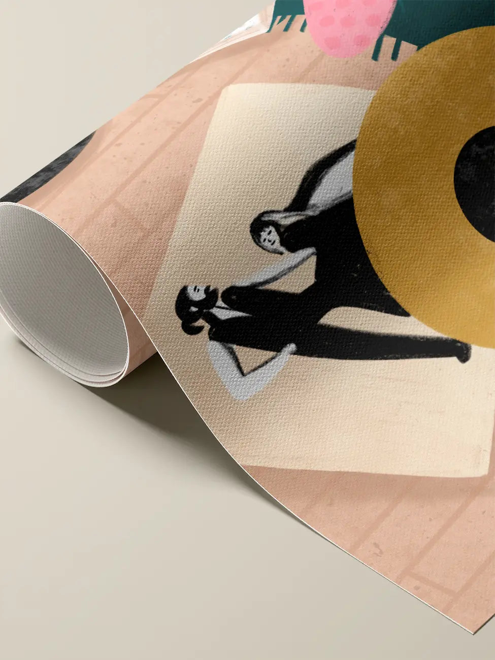 A close-up of a rolled canvas print with a modern design. The pattern features a large gold circle, black silhouettes of two figures, and a pink shape on a beige background, set against a light gray studio backdrop.