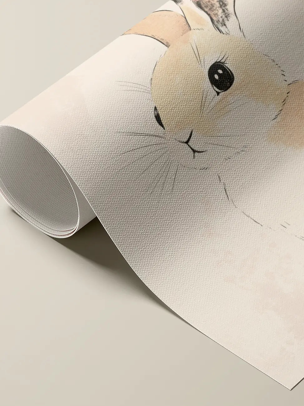 Close up of a rolled canvas print with a bunny on a light beige background